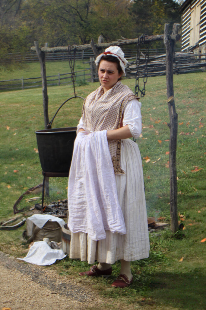 Revolutionary War living history interpreter portraying an army laundress