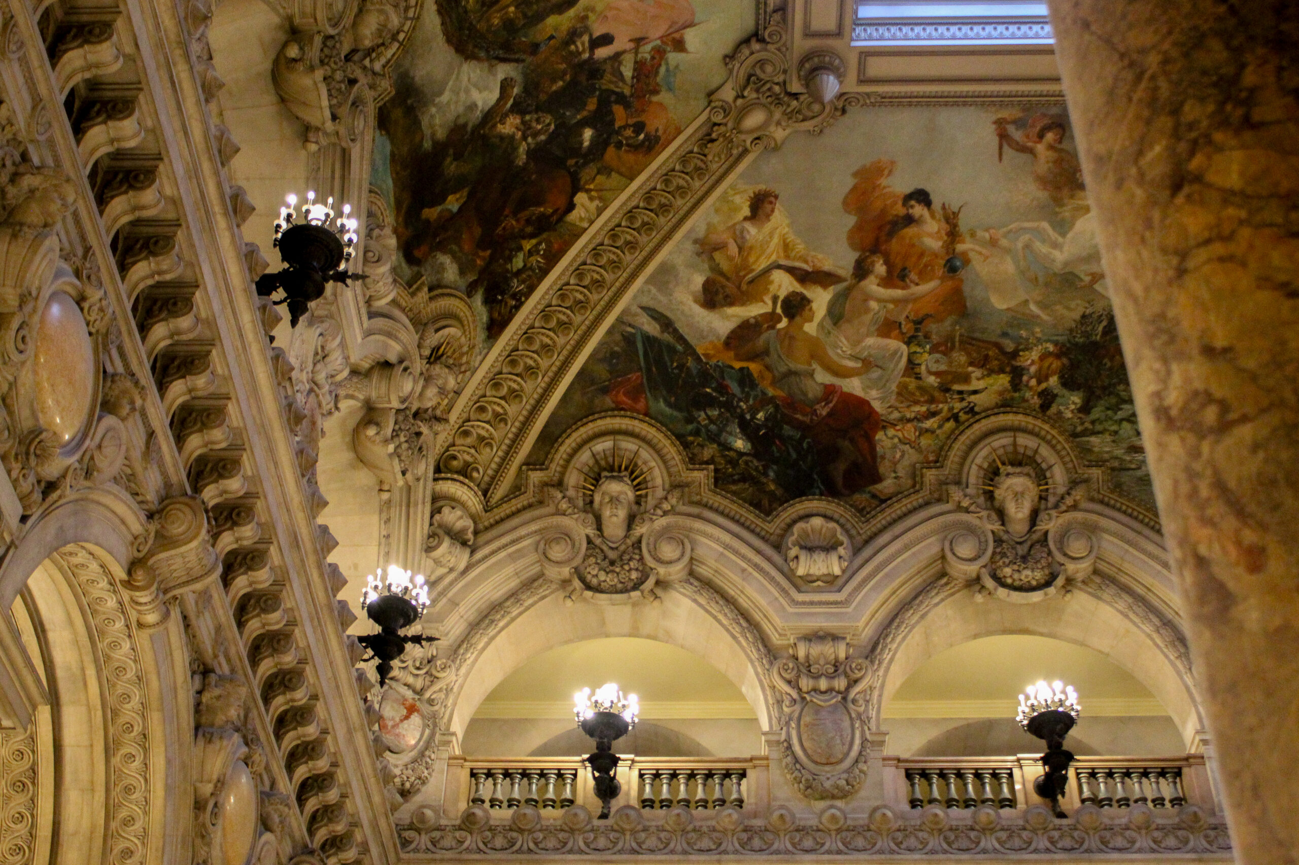 View from the Grand Staircase View of the ceiling paintings from the Grand Staircase of the Palais Garnier. Photo by Everhart Creative.