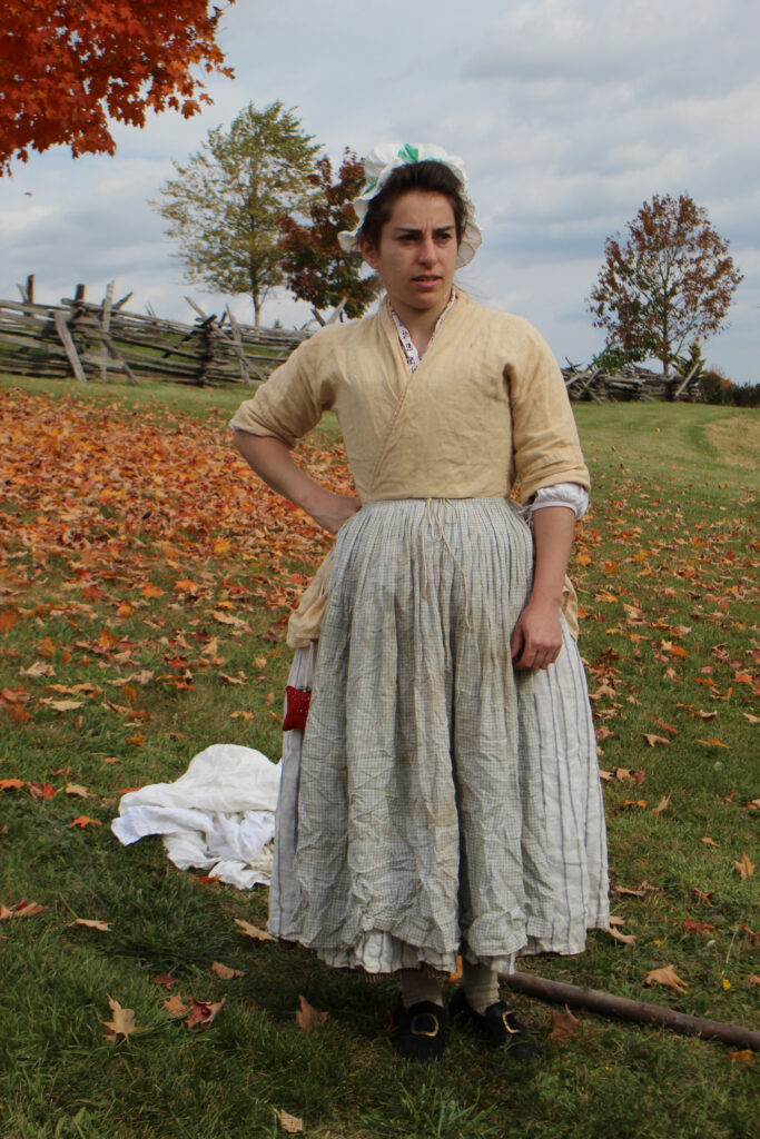 Revolutionary War living history interpreter portraying an army laundress