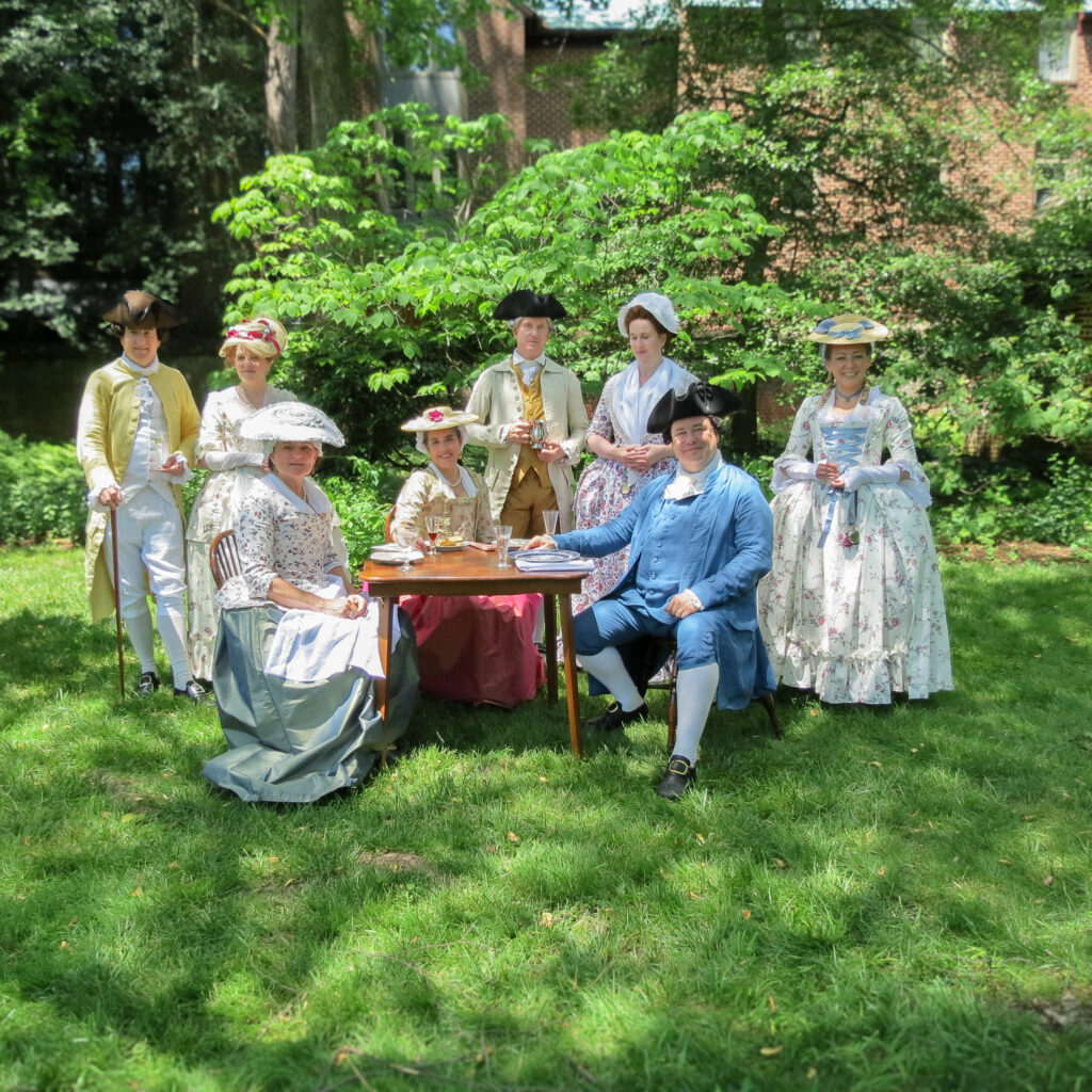 Annapolis Living Historians, an 18th-century costumed interpretive group, in the William Paca Garden. 2025.