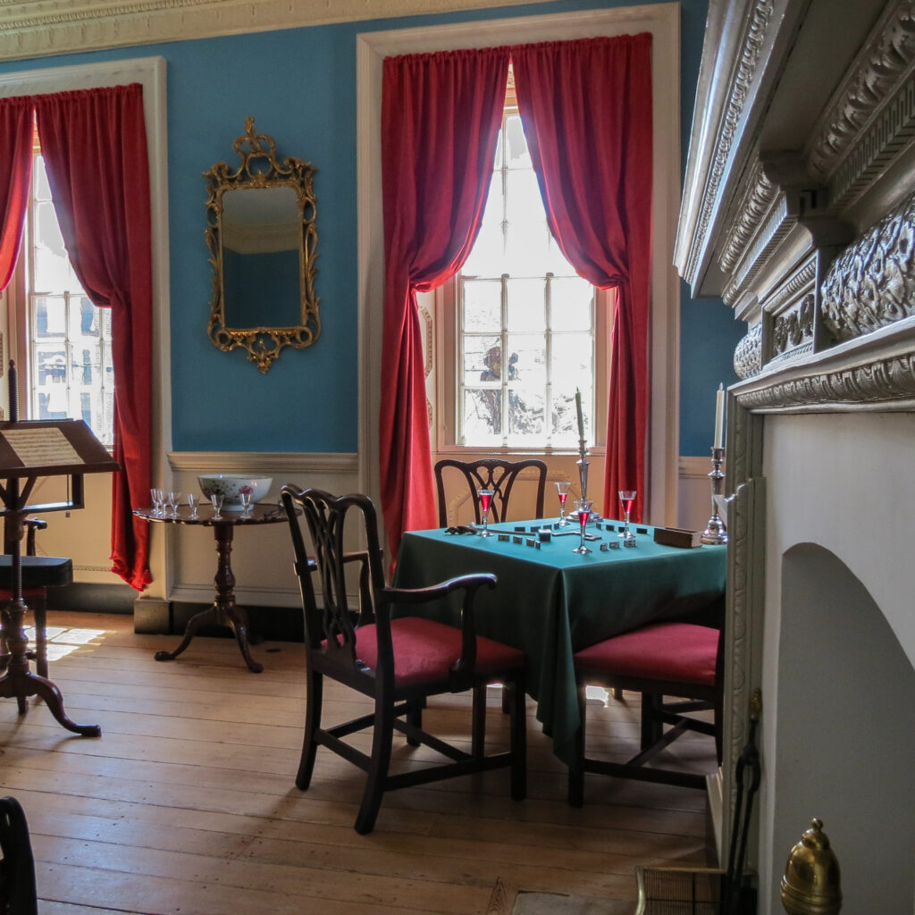 The front parlor, showing a gaming table and punch bowl, in William Paca's restored 1760 Annapolis home. 2025.