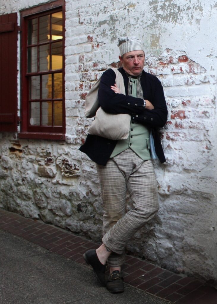 18th-century sailor reenactor on historic Wayman’s Alley.