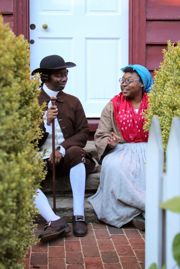 Two African American interpreters discussing daily life, 1774.