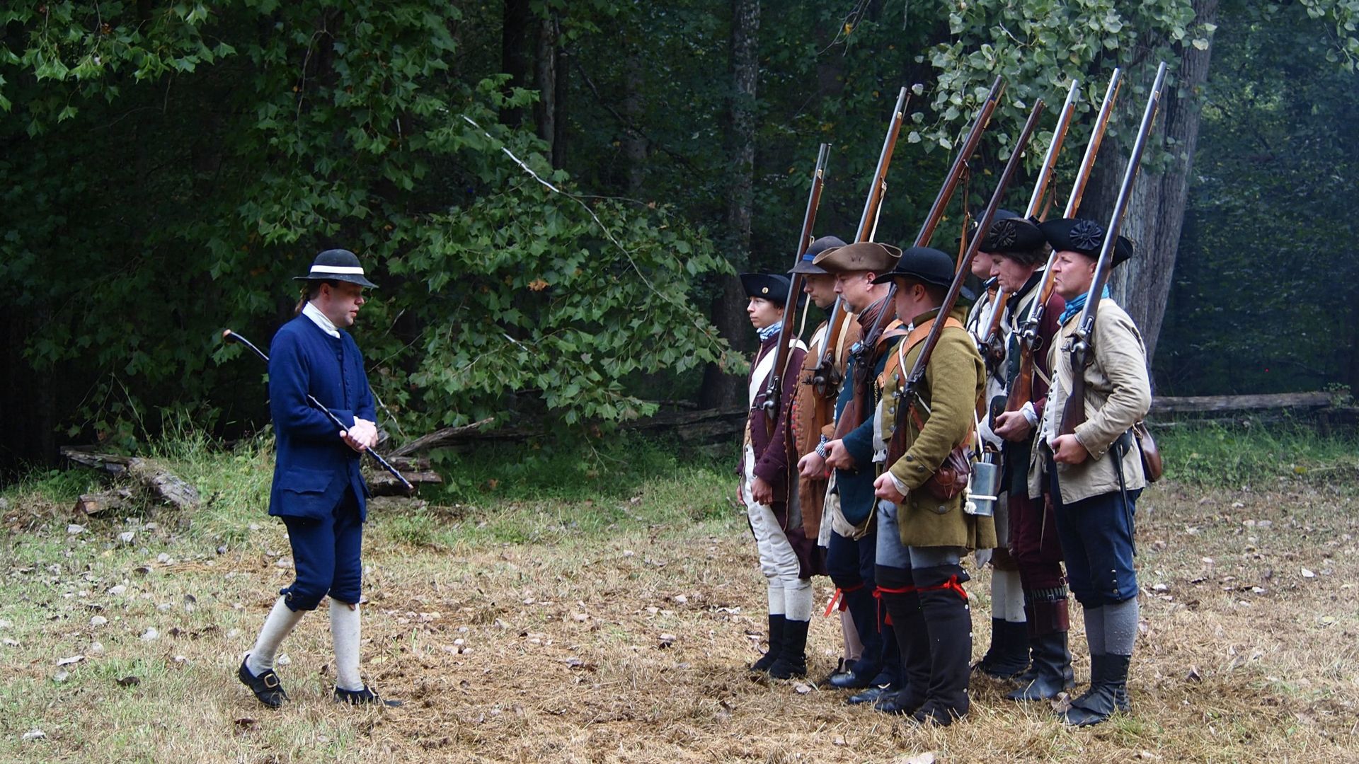 Living history photography depicts reenactors portraying a local 18th-century militia.