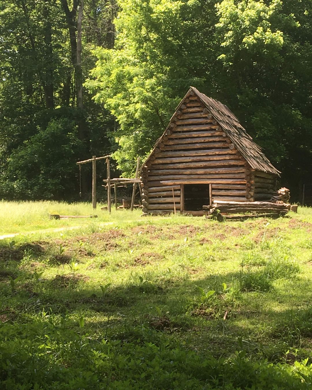 Living history site's recreated 18th-century tobacco shed.