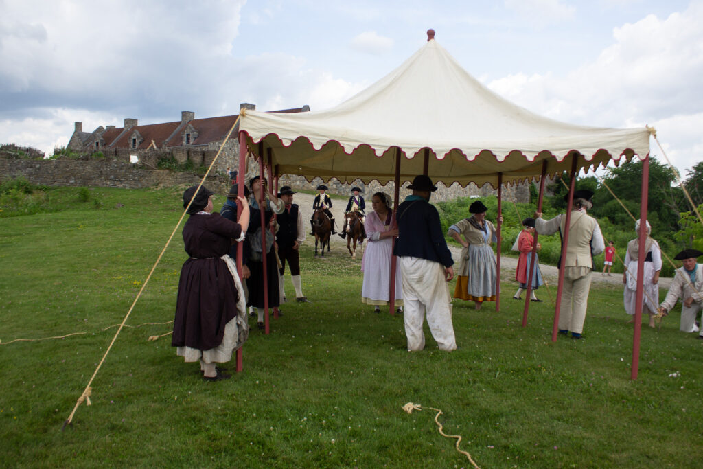 Camp followers set up a tent at Fort Ticonderoga, Ticonderoga, NY. 2026.
