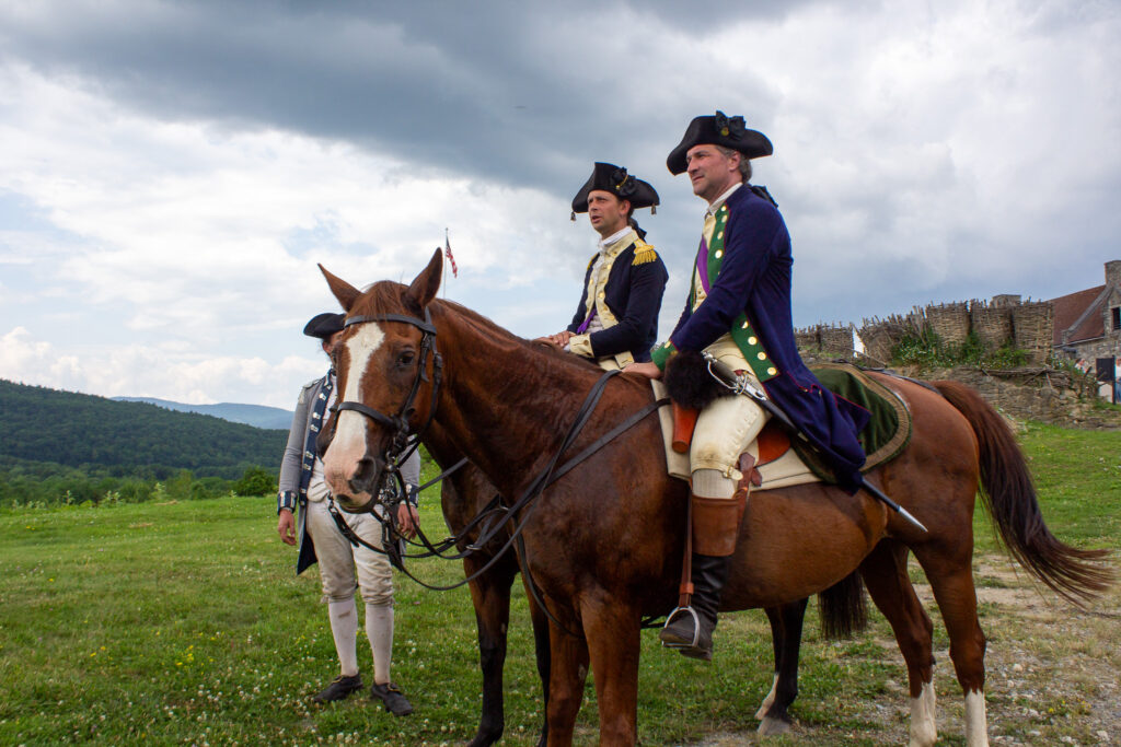 Military officers on horseback at Fort Ticonderoga, Ticonderoga, New York. 2026.