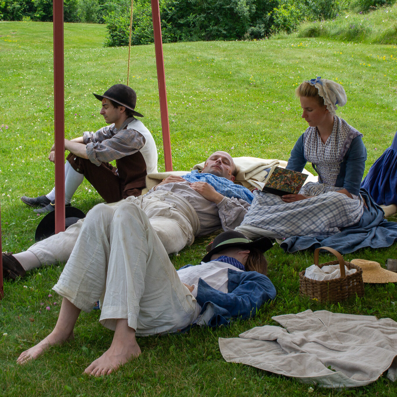 A camp follower reads to patients at the flying hospital, Fort Ticonderoga, Ticonderoga, NY. 2026.