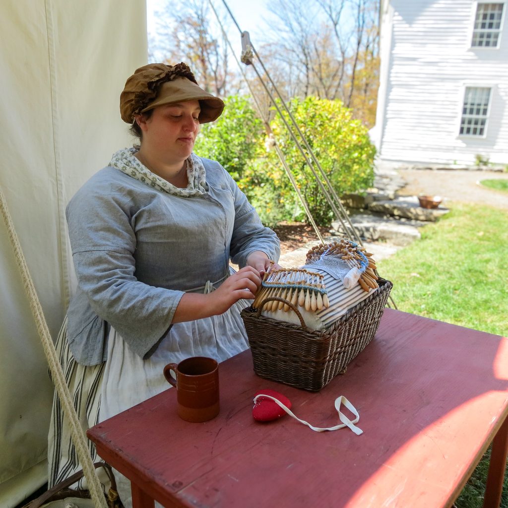 Jane of All Trades at work on her bobbin lace at Bidwell House Museum, Monterey, Massachusetts. 2025.